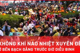 Trung tâm TP.HCM náo nhiệt đêm 29-4, người dân giữ chỗ chờ xem diễu binh