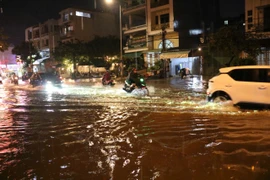 Mưa gây ngập nhiều nơi ở TP.HCM