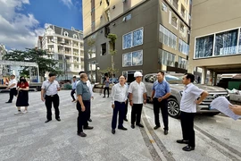 Đoàn giám sát Bộ Xây dựng đến giám sát tại một dự án bất động sản tại TPHCM. Ảnh: NGUYỄN CHÂU