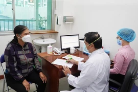 Bệnh nhân khám di chứng hậu COVID-19 ở Bệnh viện Chợ Rẫy. Ảnh: BVCC