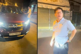 Người điều khiển chiếc xe ô tô đẩy cô gái lên nắp capo chạy khoảng 1km ở Tân Bình. Ảnh cắt từ clip