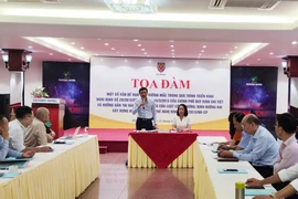 Ông Nguyễn Tấn Cường, Phó Cục trưởng Cục Bổ trợ tư pháp, Bộ Tư Pháp phát biểu tại buổi tọa đàm. Ảnh: NGUYỄN HIỀN