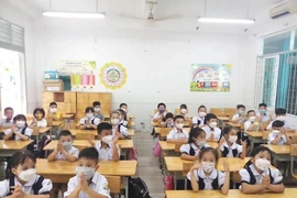 Học sinh trường Tiểu học Lê Văn Thọ, quận Gò Vấp trong 1 tiết học. Ảnh minh họa: NGUYỄN QUYÊN 
