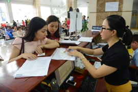 Lúng túng trong thu thuế Google, Facebook, Grab, Uber 