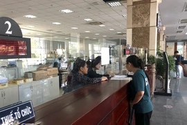 Cơ quan thuế TP.HCM làm việc cả chủ nhật để giải quyết hồ sơ đất đai tồn đọng
