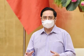 Thủ tướng: Tiếp cận mọi khả năng để có vaccine COVID-19
