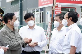 Thủ tướng: Đẩy nhanh sản xuất vaccine nội để phòng dịch COVID-19