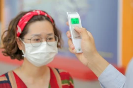 Trường Đại học Văn Lang đã trang bị máy đo thân nhiệt tại các cơ sở nhằm kiểm tra sức khỏe của sinh viên. Ảnh:website trường 