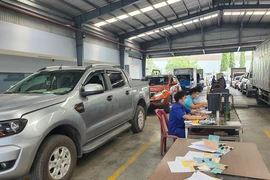 Cơ sở đăng kiểm phải cấp giấy và tem kiểm định trong 4 giờ làm việc 