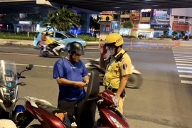 Từ 1-1-2025, các hành vi mà người đi xe máy không được thực hiện