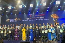 32 doanh nghiệp Thương hiệu Vàng TP.HCM năm 2023. ẢNH: TÚ UYÊN
