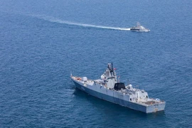 Một tàu chiến Nga trong cuộc tập trận hải quân chung giữa Iran, Nga và TQ ở Vịnh Oman ngày 15-3. Ảnh: REUTERS