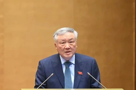 Ông Nguyễn Hòa Bình thuyết trình trước Quốc hội về Trung tâm tài chính tại TP.HCM và Đà Nẵng