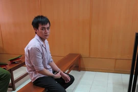 Bị cáo cười tươi sau khi nghe tòa tuyên án