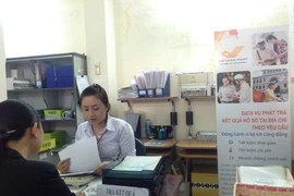 TP.HCM: 92 cơ quan hành chính trả hồ sơ qua bưu điện