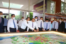 Chủ tịch nước Nguyễn Xuân Phúc chủ trì hội nghị xúc tiến đầu tư vào Hóc Môn - Củ Chi