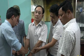 Ông Nguyễn Văn Ngưu, Giám đốc Bệnh viện đa khoa khu vực Cai Lậy lúc bị bắt. Ảnh: CATG