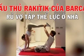 Cầu thủ Barcelona ở nhà tập thể lực cùng vợ