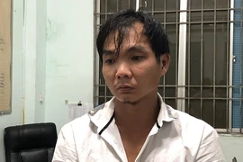 Nguyễn Hoàng Minh tại công an. Ảnh: H.G