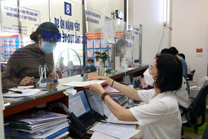 Hà Nội: Thanh toán không dùng tiền mặt tại tất cả bộ phận một cửa