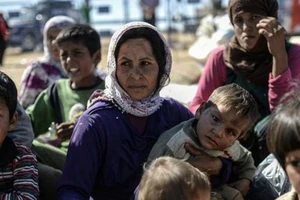 Phụ nữ và trẻ em bị IS buôn bán như ở thời trung cổ