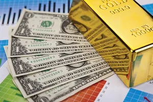 Giá vàng giảm, USD đảo chiều tăng