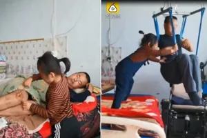 Câu chuyện cảm động về cô bé 6 tuổi chăm cha tật nguyền