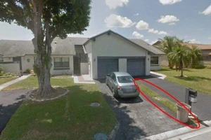 Bỏ tiền mua biệt thự kết quả chỉ là... một mẩu đất trước sân