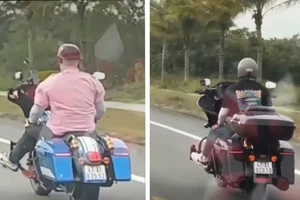 Lái mô tô buông cả 2 tay trên đường ven biển, 2 người nước ngoài bị xử phạt