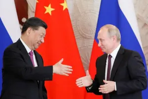 Chủ tịch Trung Quốc Tập Cận Bình (trái) và Tổng thống Nga Vladimir Putin. Ảnh: REUTERS