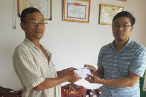 Bạn đọc trao gần 63 triệu cho gia đình hiệp sĩ bị đâm tử vong 