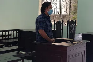 Bị tội vu khống khi làm đơn xin cứu xét nhắc đến phó giám đốc công an