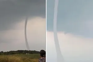 Vòi rồng ‘khổng lồ’ thẳng đứng xuất hiện trên hồ Trị An