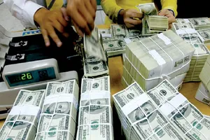 Dự trữ ngoại hối kỷ lục 45 tỉ USD, tỉ giá sẽ ra sao ?