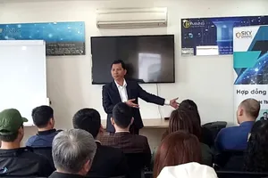 Ông Lê Minh Tâm trong một buổi thuyết trình cho nhà đầu tư. 