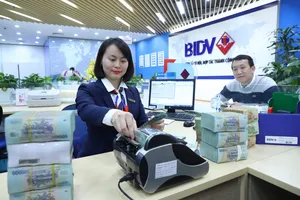 Nhu cầu vay tiền sản xuất kinh doanh tăng mạnh