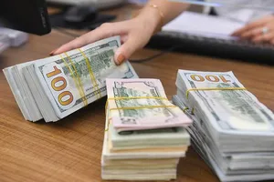 Ngân hàng Nhà nước hạ tỉ giá bán USD lần thứ 3 liên tiếp