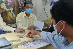 Vàng miếng SJC bất ngờ tăng phi mã