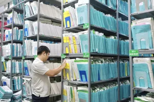 Thay vì lưu trữ bệnh án giấy như hiện nay, khi áp dụng hoàn toàn EMR, các BV sẽ lưu trữ hồ sơ, giấy tờ… trên môi trường số. Ảnh: DI LINH