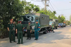 Quân đội có mặt tại khu vực vây ráp kẻ xả súng ở Củ Chi