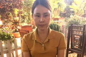 Bắt quả tang 1 phụ nữ nhận 115 triệu đồng để chạy án