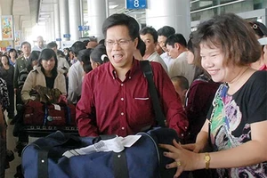 Việt kiều sẽ không còn phải đăng ký giữ quốc tịch Việt Nam