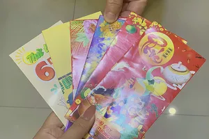 Dạy trẻ hiểu tiền lì xì sao cho đúng?