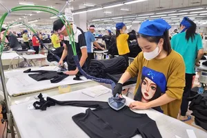 Doanh nghiệp có bắt buộc thưởng Tết cho người lao động không?