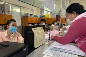 Ký tại 22 chi nhánh quận, huyện, giảm trễ hạn cấp sổ hồng