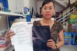 Bà Thủy cho biết đã cùng chồng phải tự đi chữa trị vết thương sau khi bị các đối tượng hành hung.