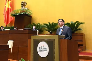 Thủ tướng Phạm Minh Chính trả lời chất vấn trước Quốc hội vào sáng 12-11.