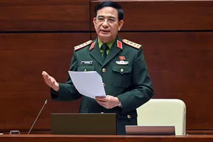 Đại tướng Phan Văn Giang, Bộ trưởng Bộ Quốc phòng, báo cáo giải trình về dự thảo Luật Phòng thủ dân sự.