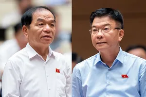 Đại biểu Quốc hội Lê Thanh Vân (trái) và Bộ trưởng Bộ Tư pháp Lê Thành Long tại phiên thảo luận.