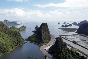 Khu đô thị tại khu 10B ở phường Quang Hanh (TP Cẩm Phả, Quảng Ninh) đang được san lấp nằm trong vùng đệm, khu vực 2 của di sản thiên nhiên thế giới vịnh Hạ Long.